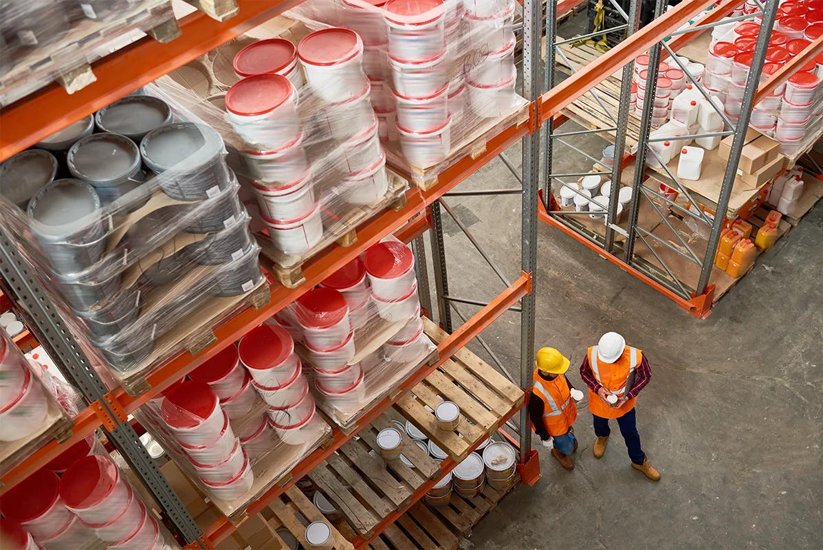 two workers in modern warehouse